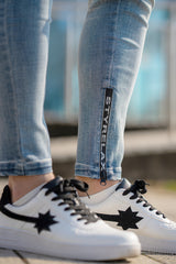 ロゴジップデニムパンツ