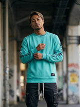 クロスネックラメトレーナー