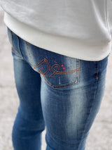 レッドペイントデニムパンツ