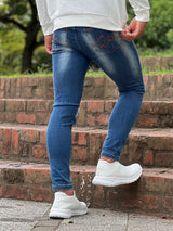 レッドペイントデニムパンツ