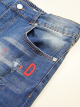 レッドペイントデニムパンツ
