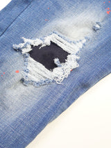 レッドペイントデニムパンツ