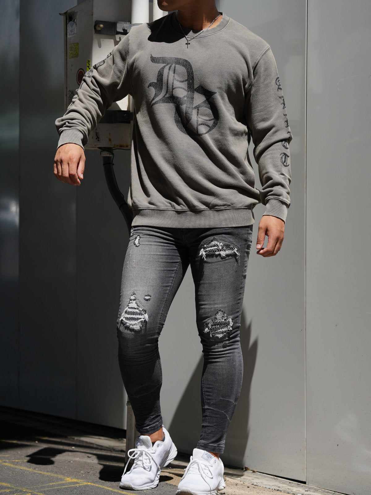 DSQUARED2 ブラック トレーナー　プリントクラック クラックプリントトレーナー – DayGLORY