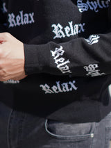 英字総柄ニット