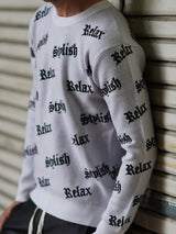 英字総柄ニット