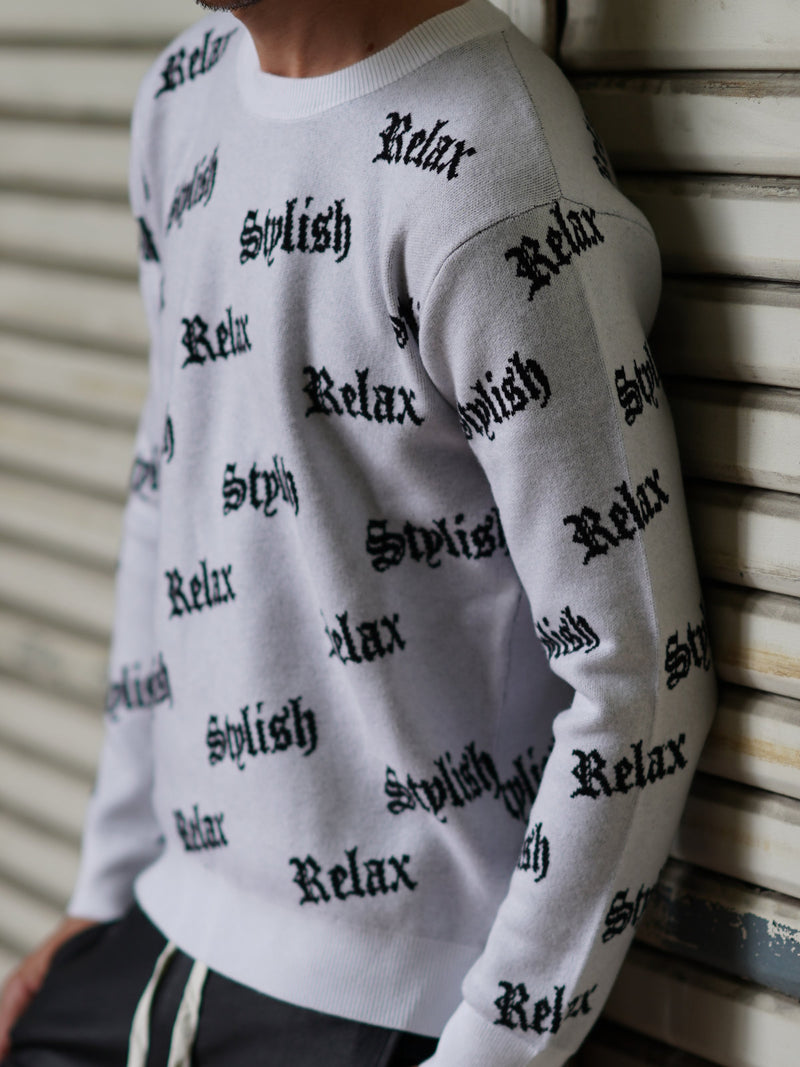 英字総柄ニット